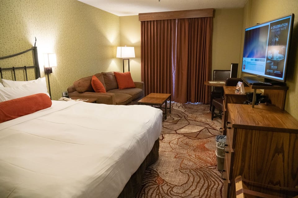 Flatscreen TV and mini fridge for a quiet evening in — The Keg downstairs if you'd rather let someone else cook