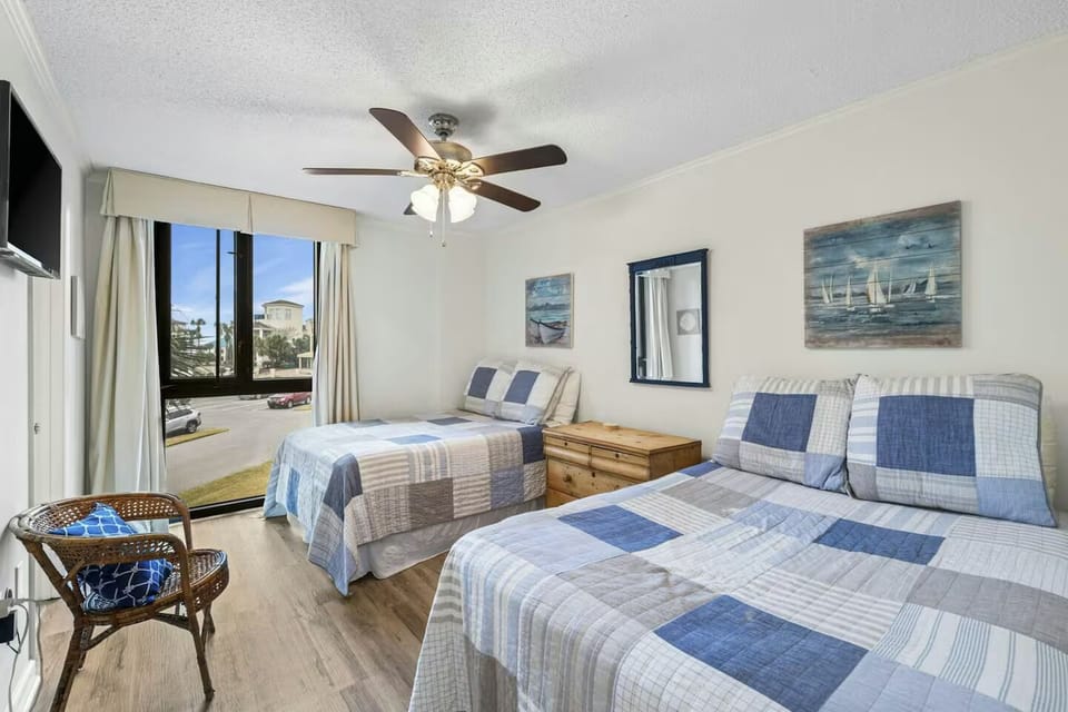 Guest room 1 with two full beds