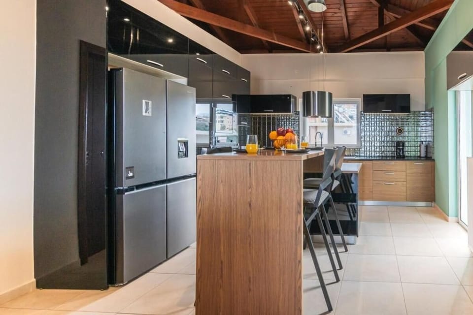 Apartment, Balcony, Sea View | Private kitchen | Electric kettle, toaster