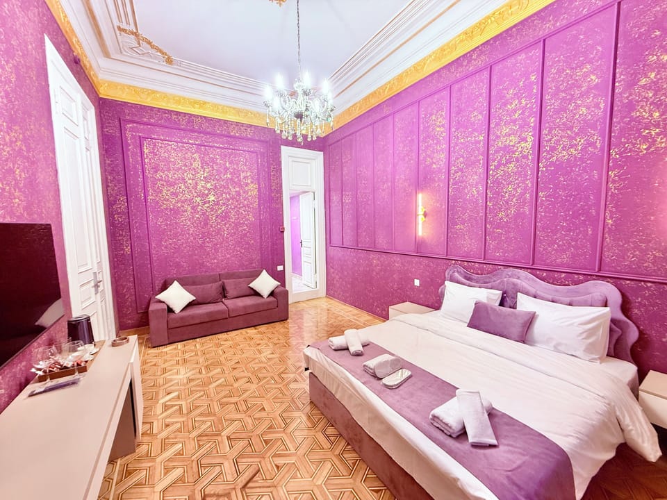 Family Suite, City View | Desk, laptop workspace, iron/ironing board, free WiFi