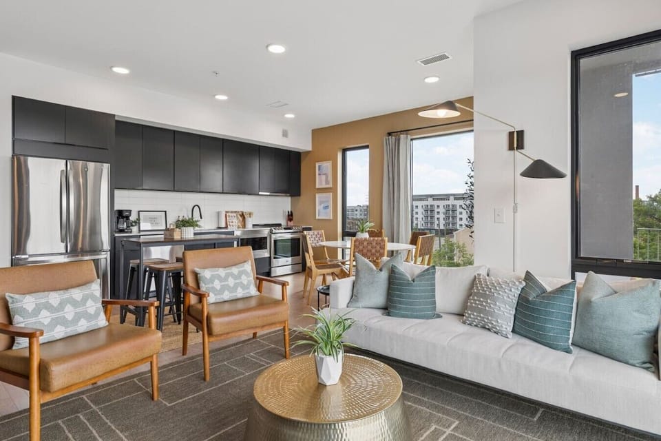Enjoy a spacious, inviting, and relaxing stay in the heart of Nashville. Beautiful condo with all the furnishings and supplies you might need. Private balcony off of the living room. Futon Sofa and Smart TV with all the apps in the living room.