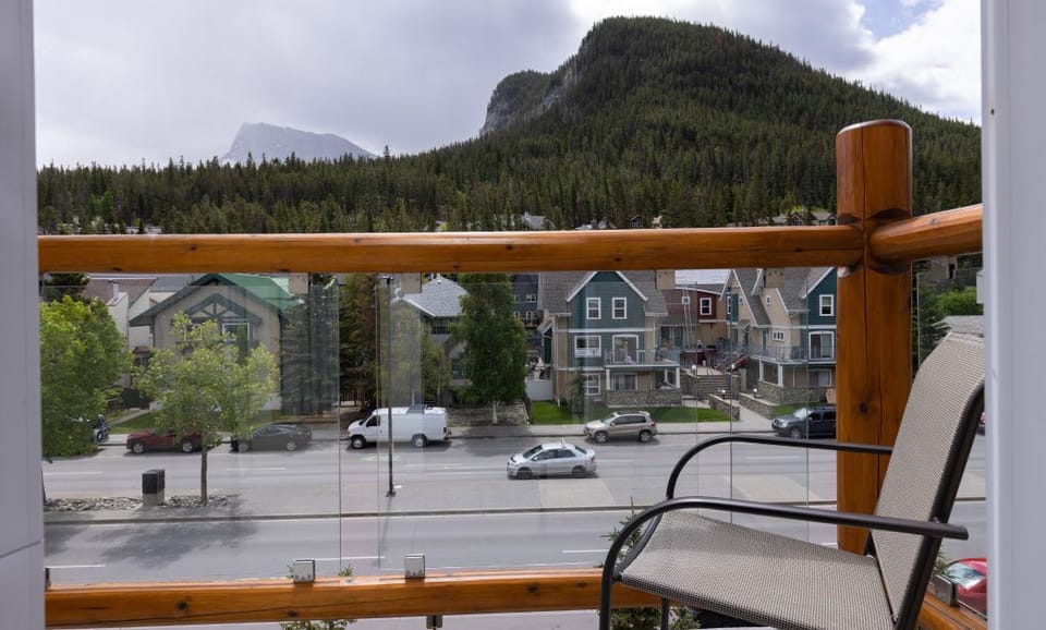 Private balcony with mountain views.