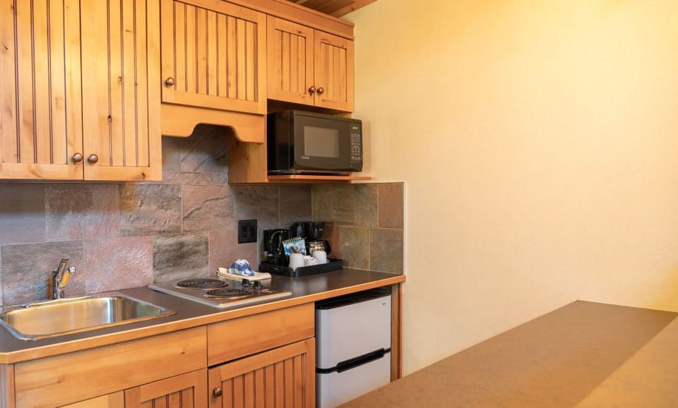 Kitchenette with coffee maker.
