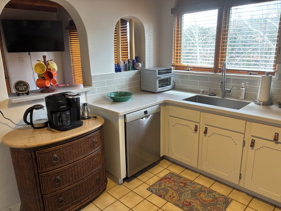 Upstairs kitchen with dishwasher