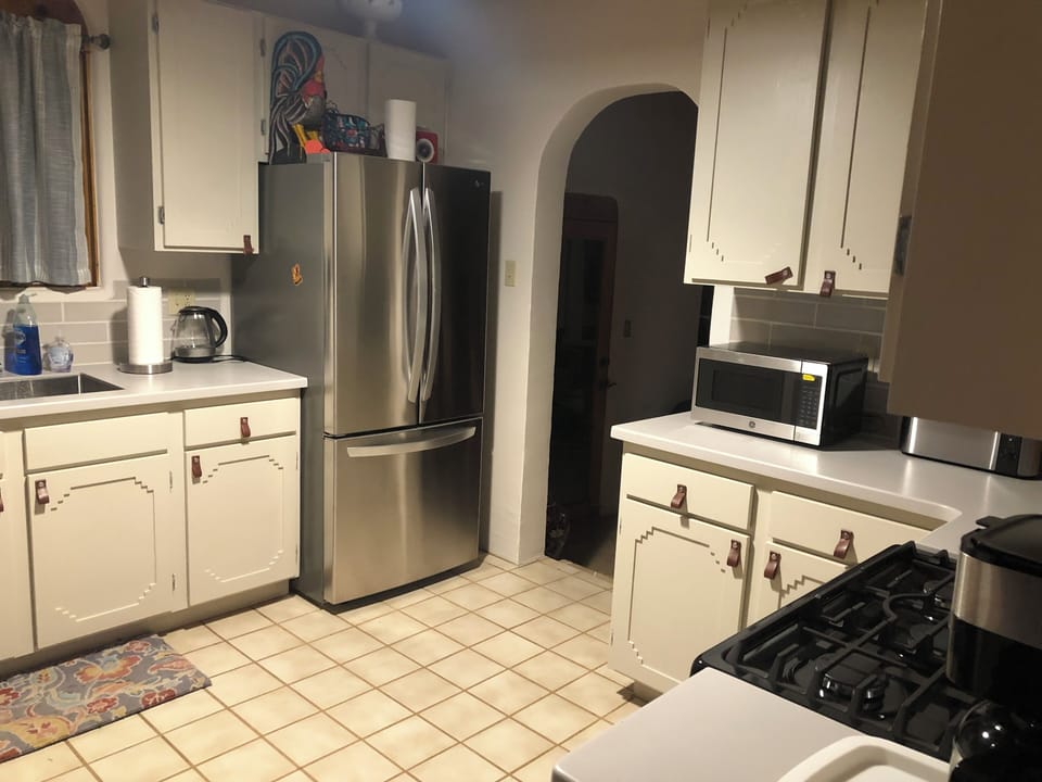 Upstairs kitchen with ice maker in refrigerator drawer.