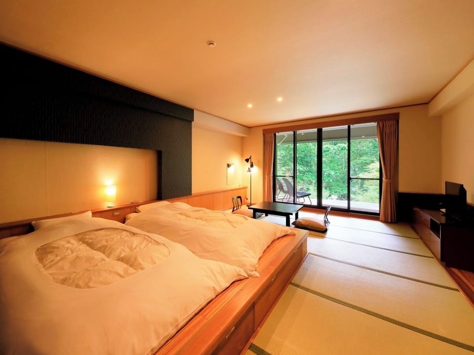 Japanese Western Style Superior Room with Private Open-Air Bath | Down comforters, in-room safe, individually decorated