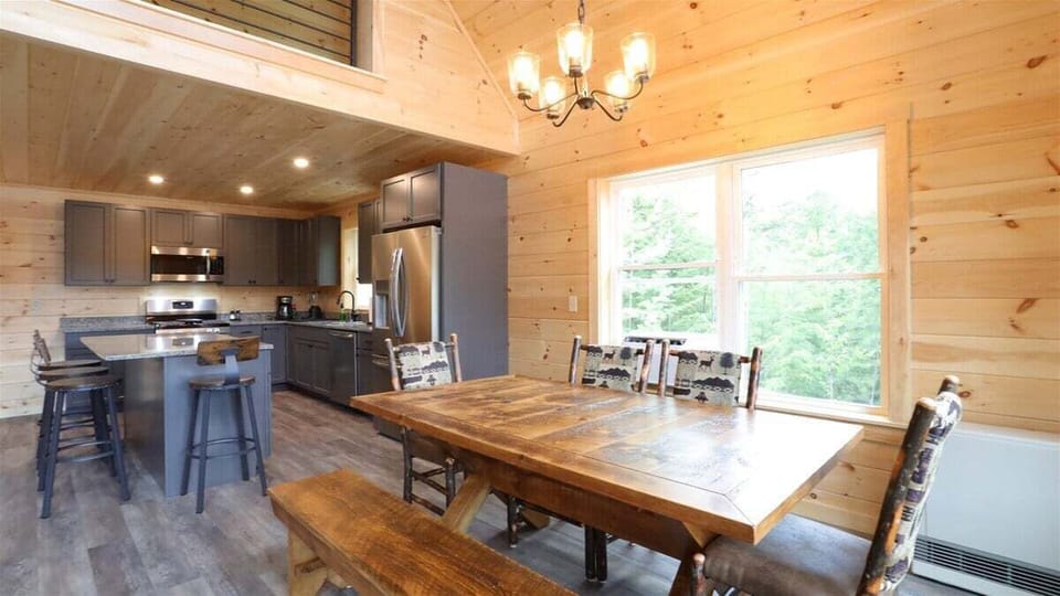 Dining Room With Window A/C in Home Near Waterville Valley
