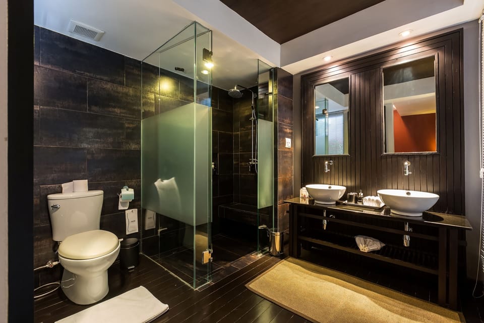 Family Suite | Bathroom | Hair dryer, slippers, towels, soap