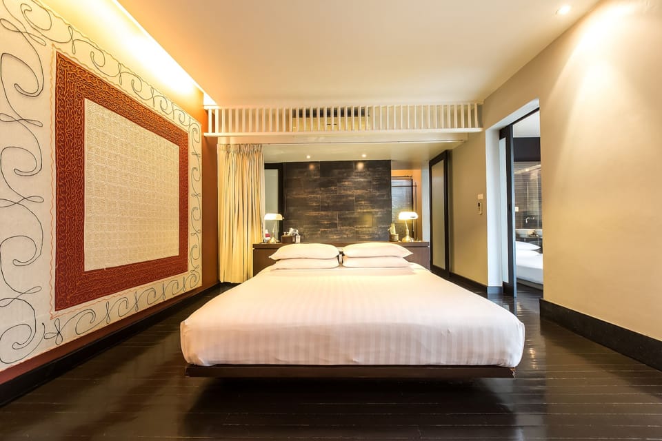 Family Suite | Blackout drapes, iron/ironing board, free WiFi, bed sheets