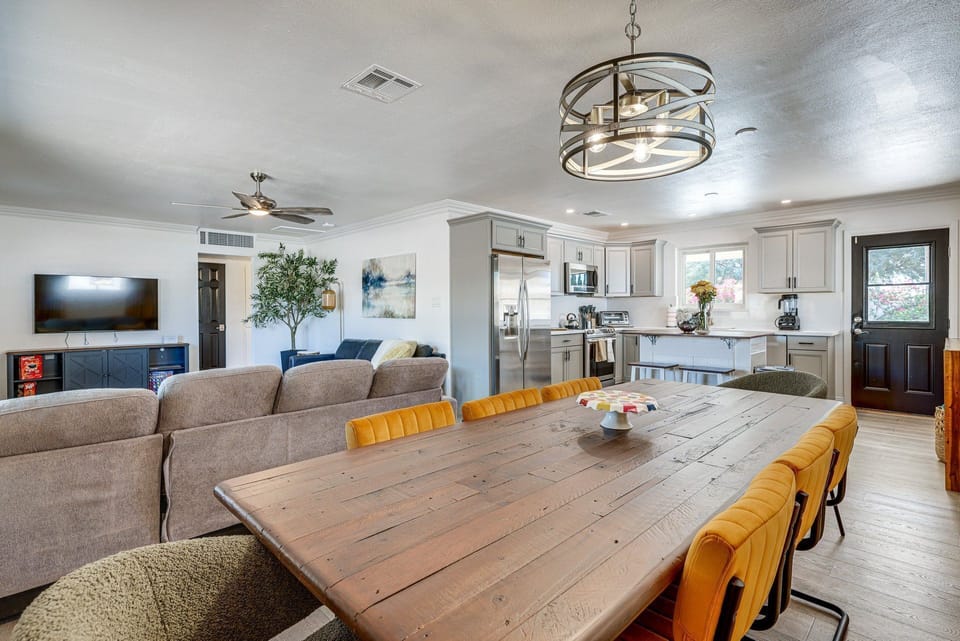 Gather around the large dining table for shared meals and cherished memories in the heart of your vacation.