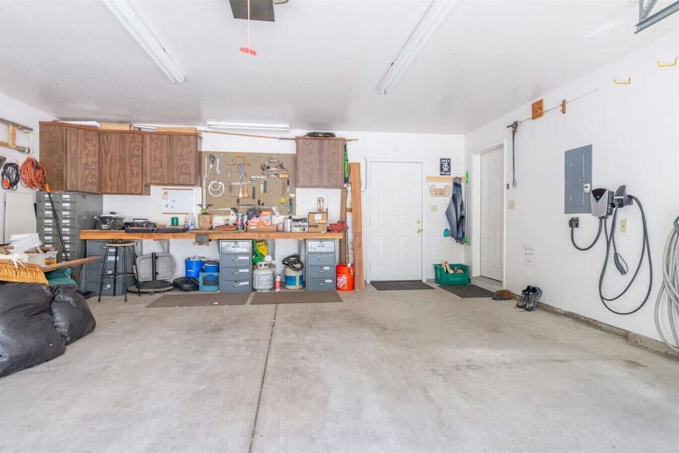 Two car attached garage with EV Charger!