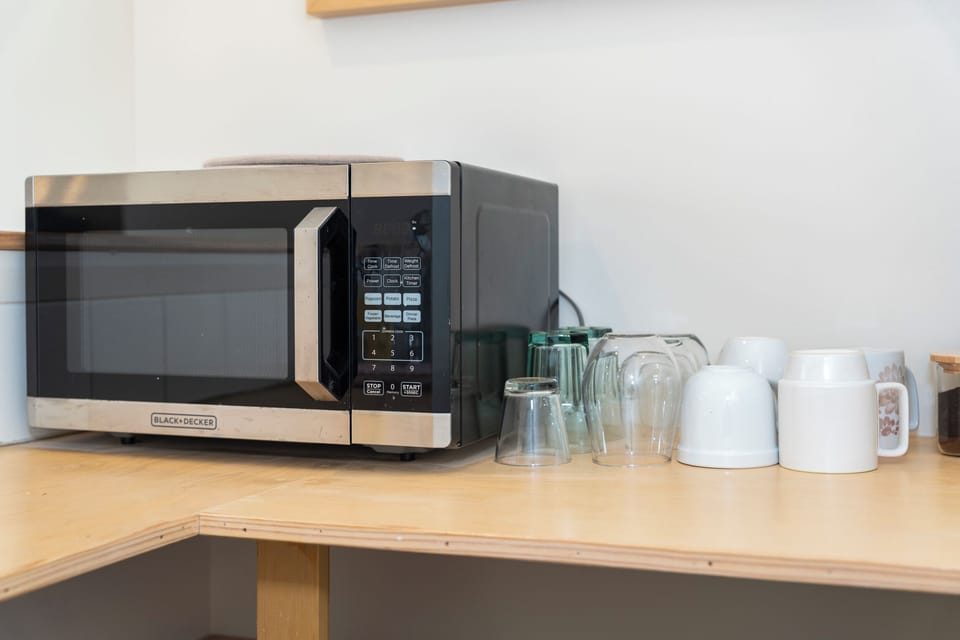 Microwave and a mini fridge are provided 