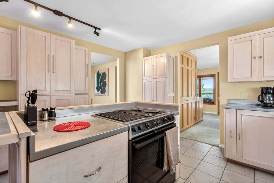 Spacious open kitchen with modern appliances and plenty of room to prepare meals with ease.