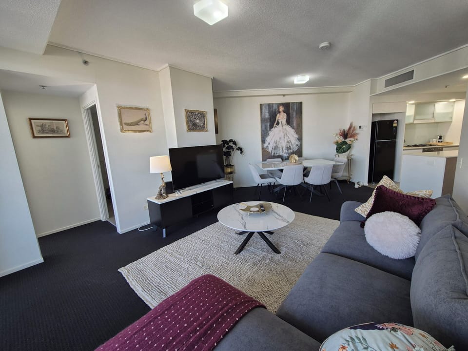 Deluxe Apartment, River View | Living area | 60-inch Smart TV with digital channels, Netflix, streaming services