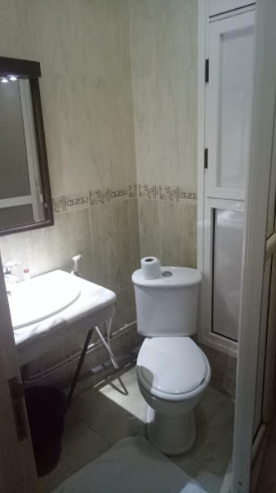 Shower, rainfall showerhead, hair dryer (on request), towels