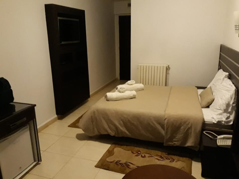 Desk, WiFi (free), bed sheets