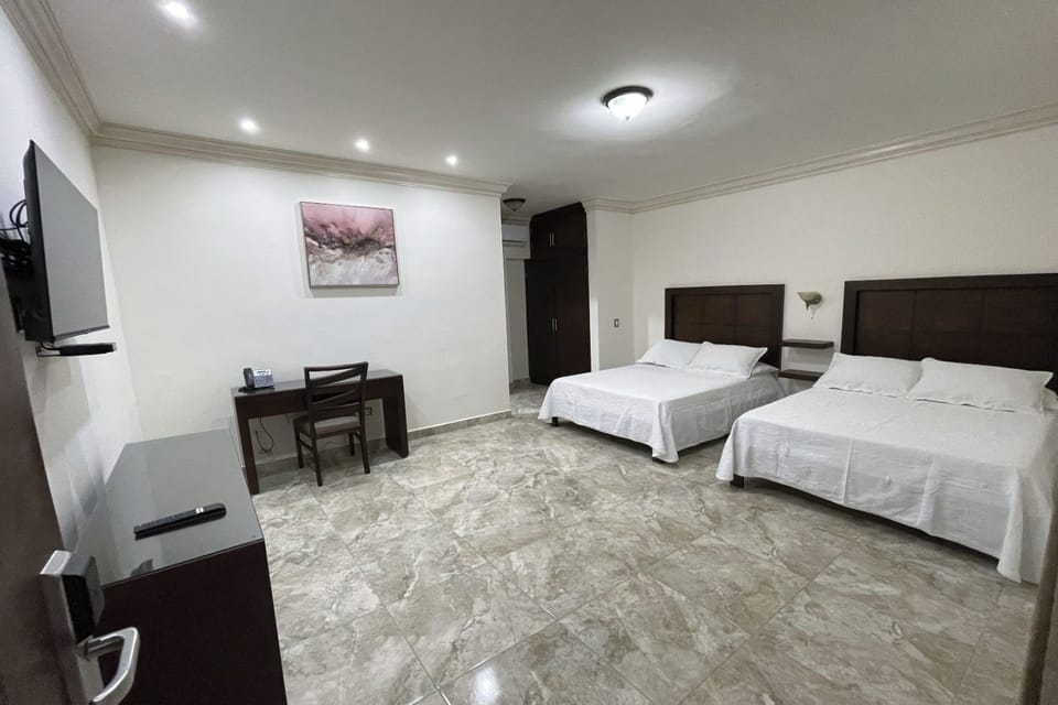 Comfort Double Room, City View | In-room safe, desk, laptop workspace, iron/ironing board
