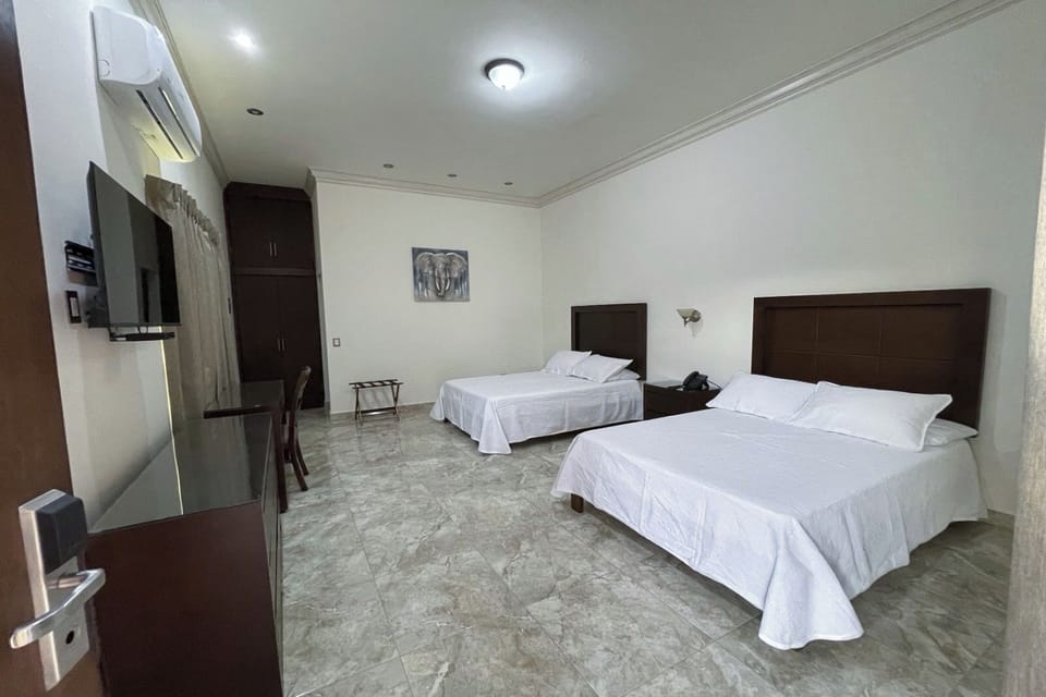 Classic Double Room, City View | In-room safe, desk, laptop workspace, iron/ironing board