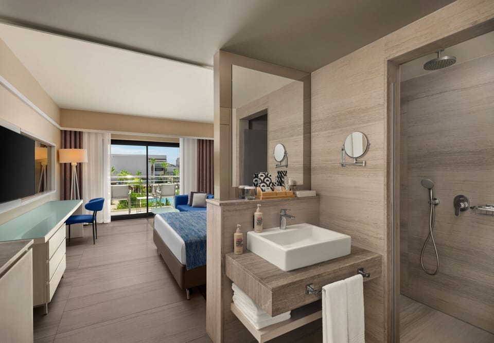 Standard Room, Partial Sea View (Adult) | Bathroom | Combined shower/tub, eco-friendly toiletries, hair dryer, bathrobes