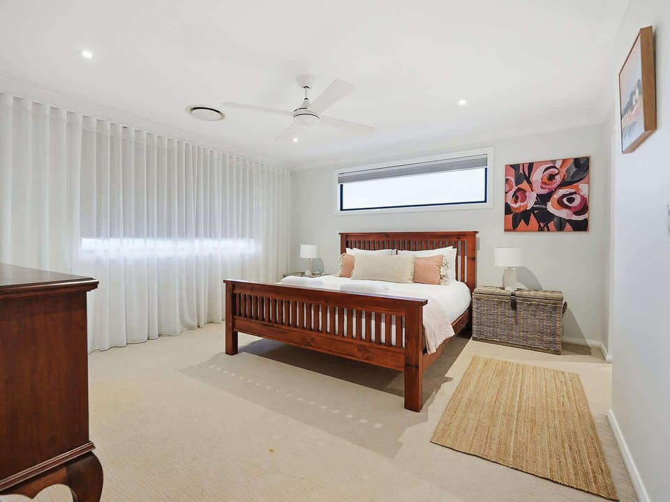Master Bedroom with King Bed + Ensuite