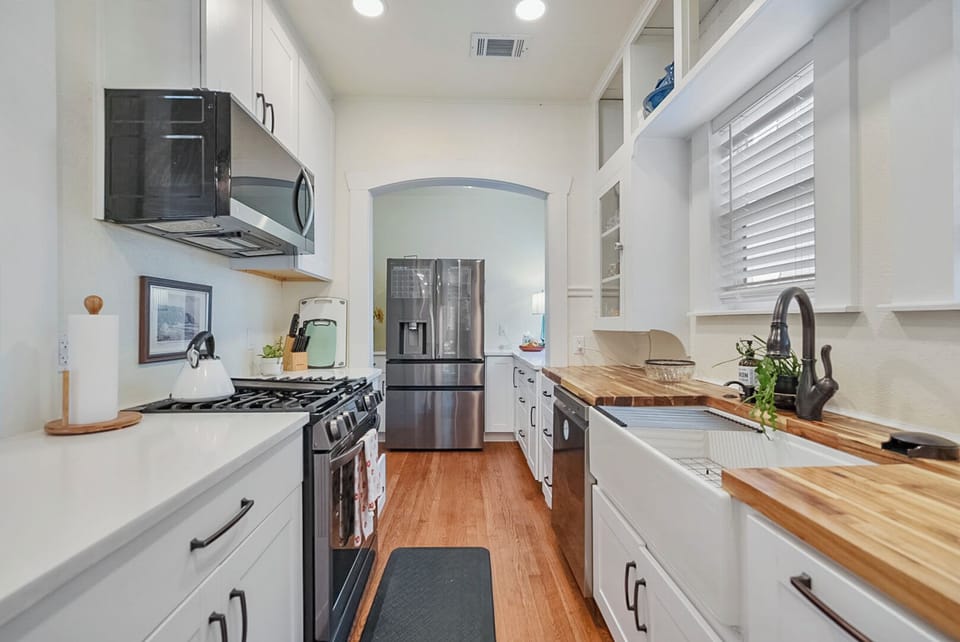 Fully Equipped Kitchen • Prepare meals with ease and convenience