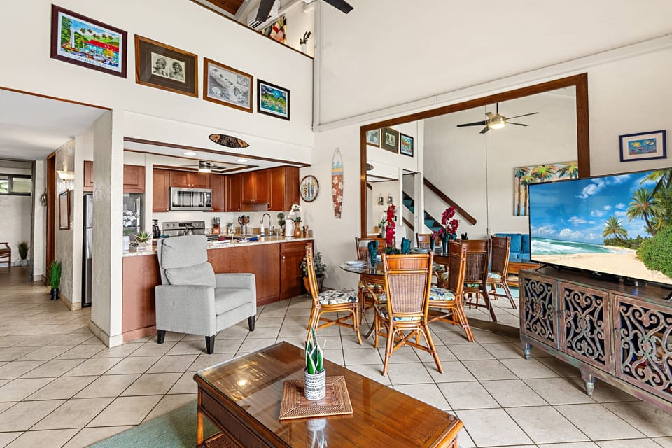 Open-concept living and dining area filled with natural light.