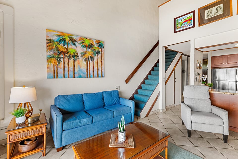 Comfortable living room with soaring ceilings and island-inspired décor.