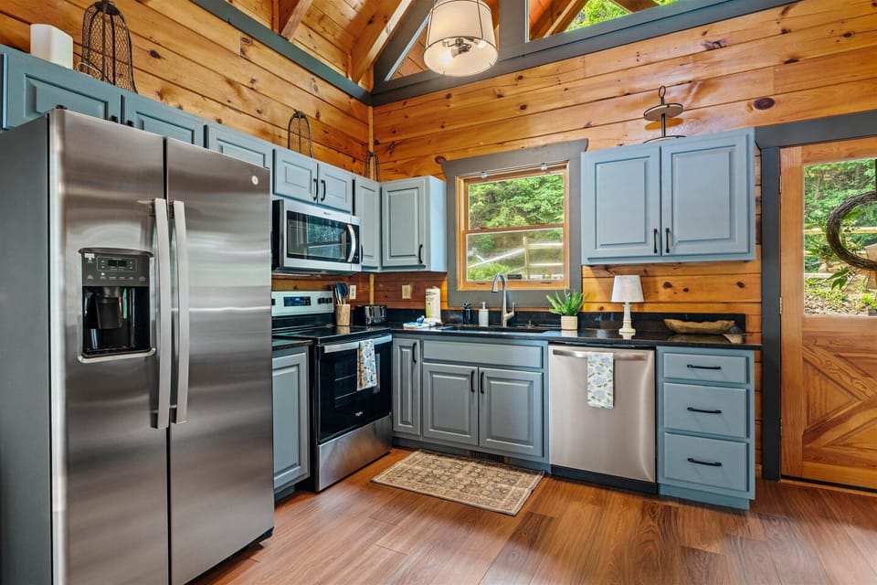 Full-size stainless fridge, stove top/oven, microwave and dishwasher.   Everything you need to feel at home. 