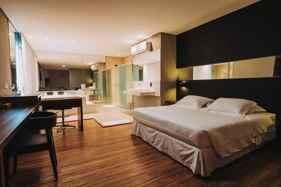 Presidential Studio Suite | Minibar, desk, blackout drapes, iron/ironing board (on request)