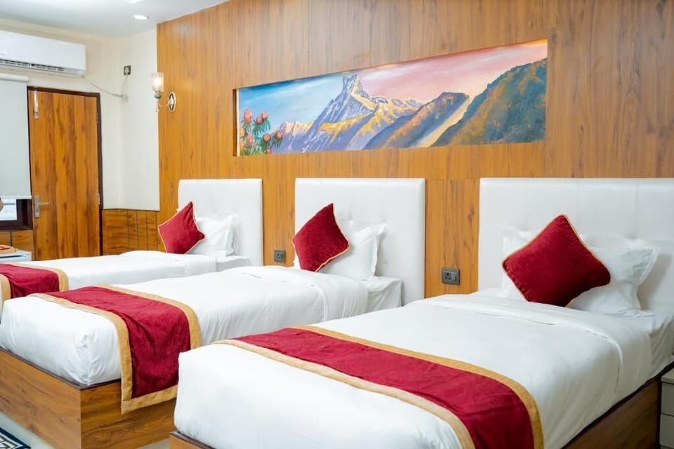 Deluxe Quadruple Room | In-room safe, soundproofing, free WiFi, bed sheets