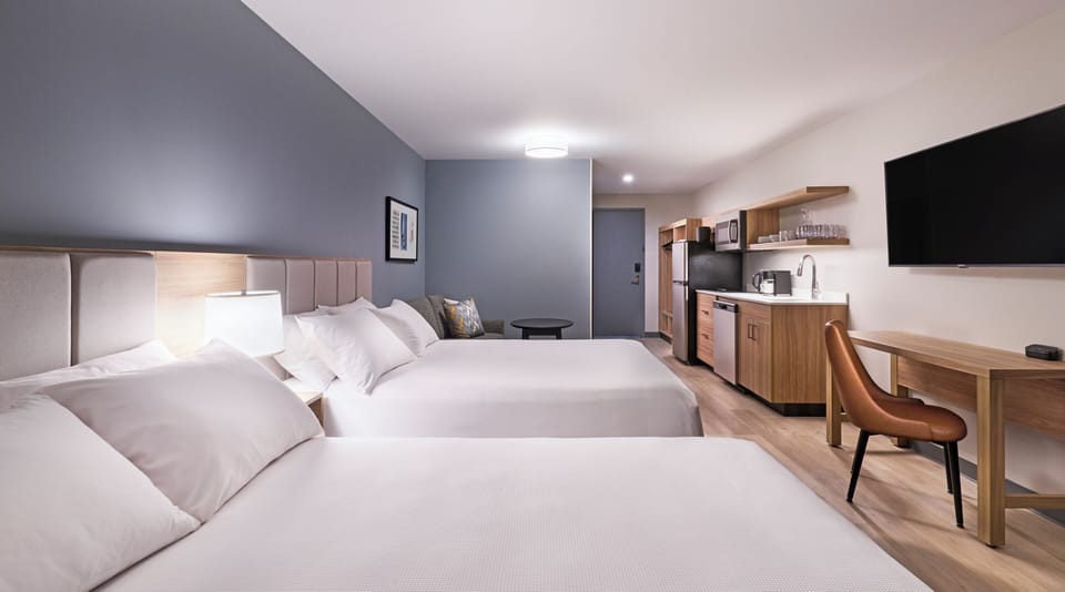 Studio Suite, 2 Queen Beds | Desk, laptop workspace, blackout drapes, iron/ironing board