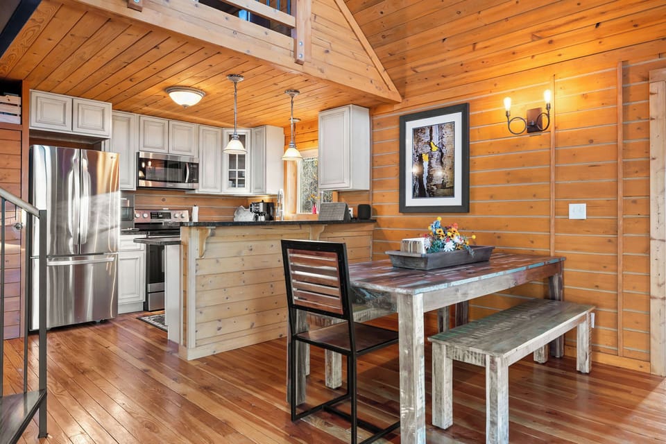 Enjoy meals, morning coffee, or evening chats in the inviting open-concept gathering space.