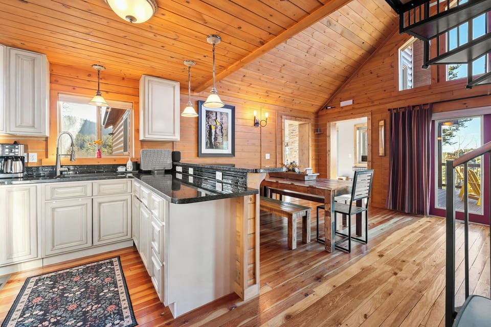 Enjoy easy meals and time together in the open kitchen and dining area.