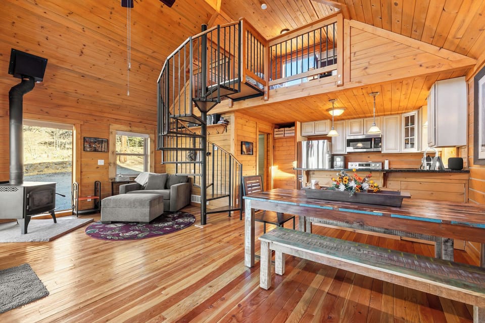 Gather in the bright dining area with a fully equipped kitchen.
