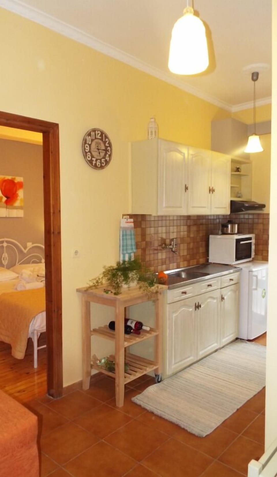 Apartment | Private kitchenette | Full-size fridge, stovetop, coffee/tea maker, cookware/dishes/utensils