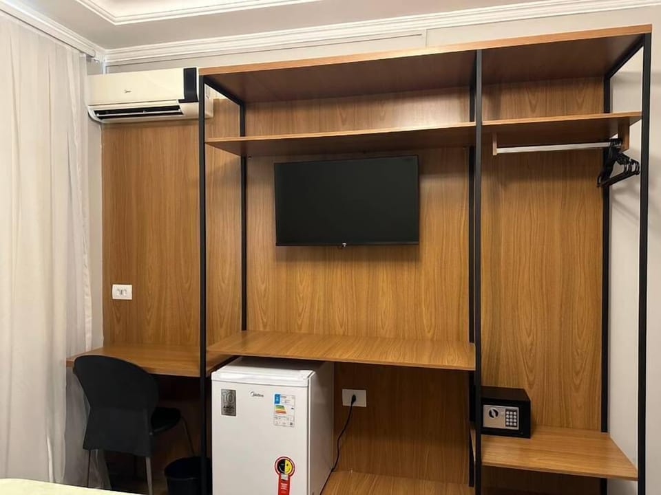 Standard Double Room | Minibar, desk, blackout drapes, iron/ironing board (on request)