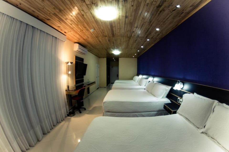 Premium Room, Non Smoking (4 double beds ) | Minibar, in-room safe, desk, iron/ironing board