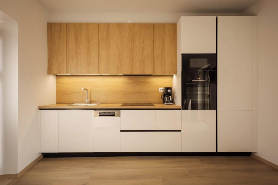 Thoughtfully designed for convenience, this modern kitchen offers ample workspace, quality appliances, and all the essentials needed to create delicious meals at home