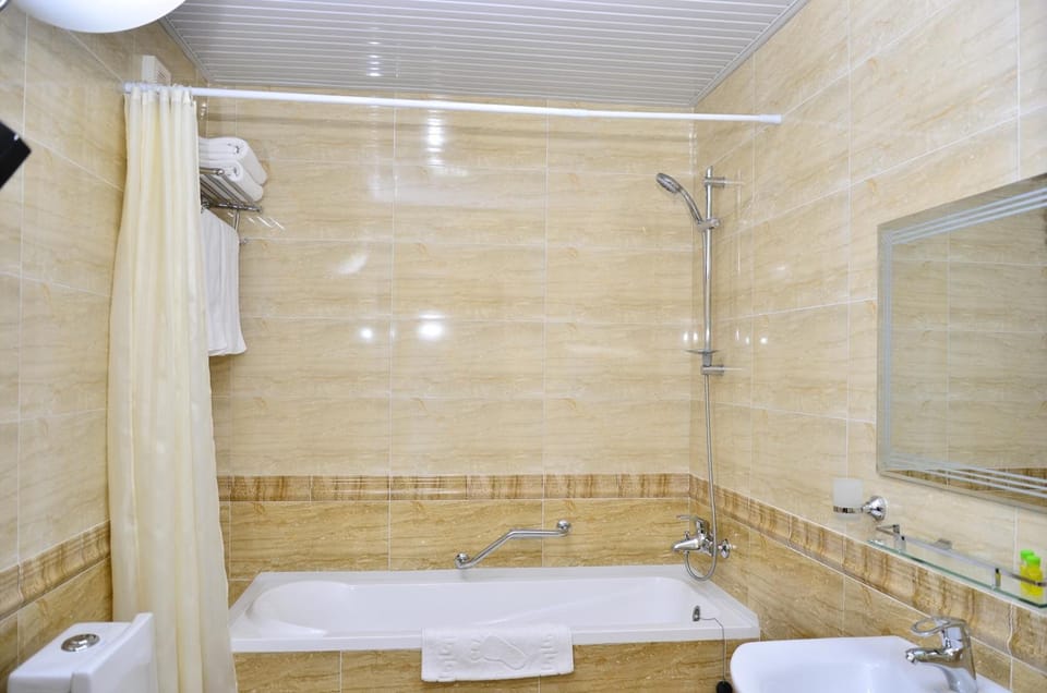 Hair dryer, slippers, towels