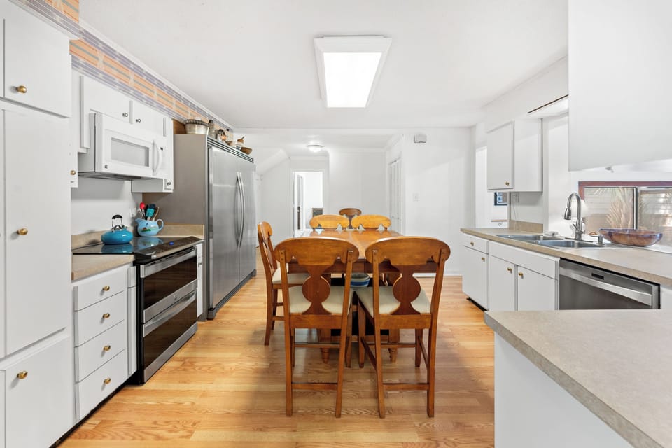Eat in kitchen with seating for 6 and a full stocked kitchen