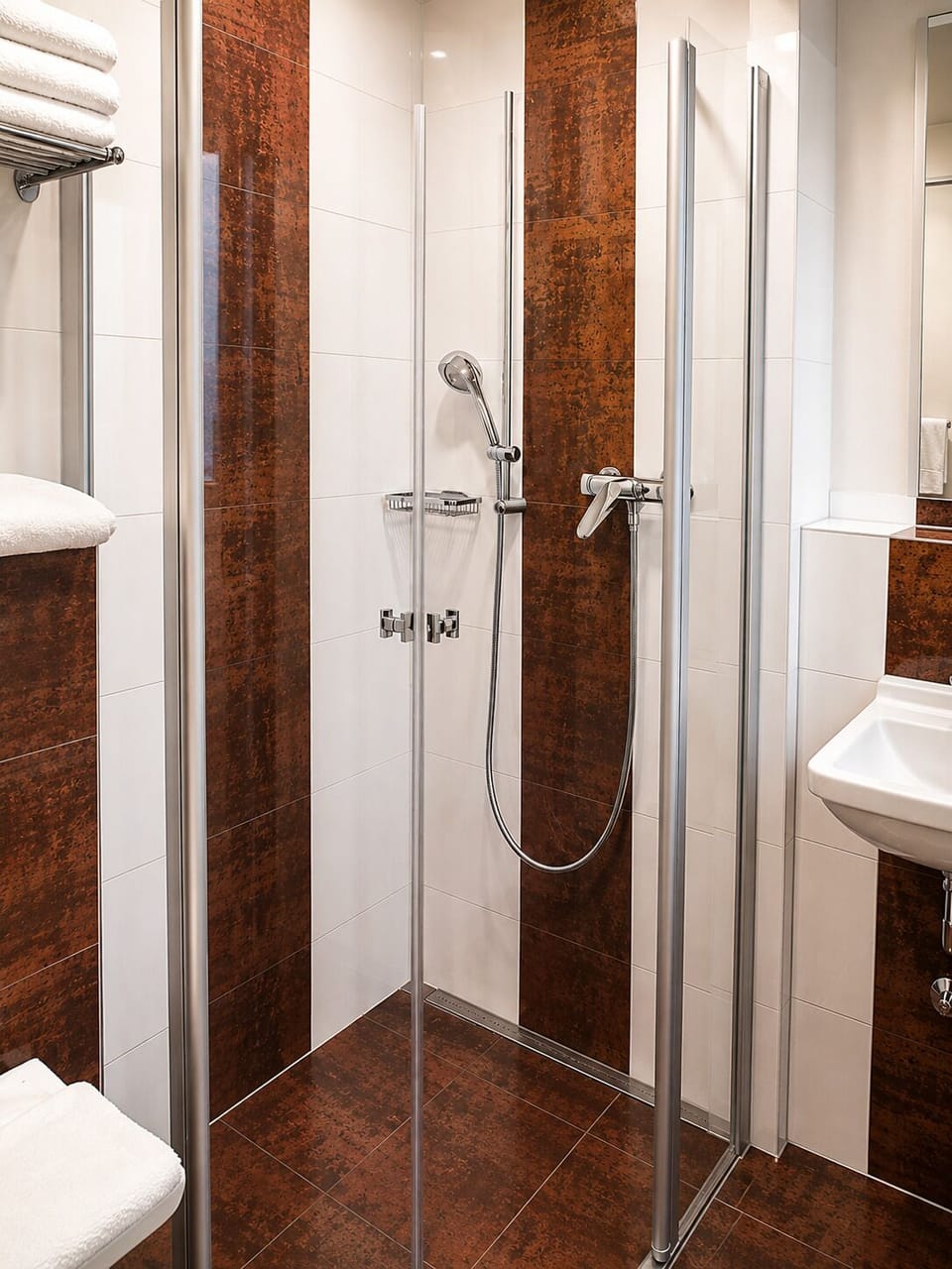 Shower, free toiletries, hair dryer, towels