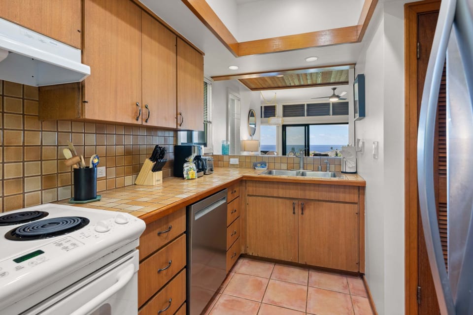 The kitchen includes a dishwasher