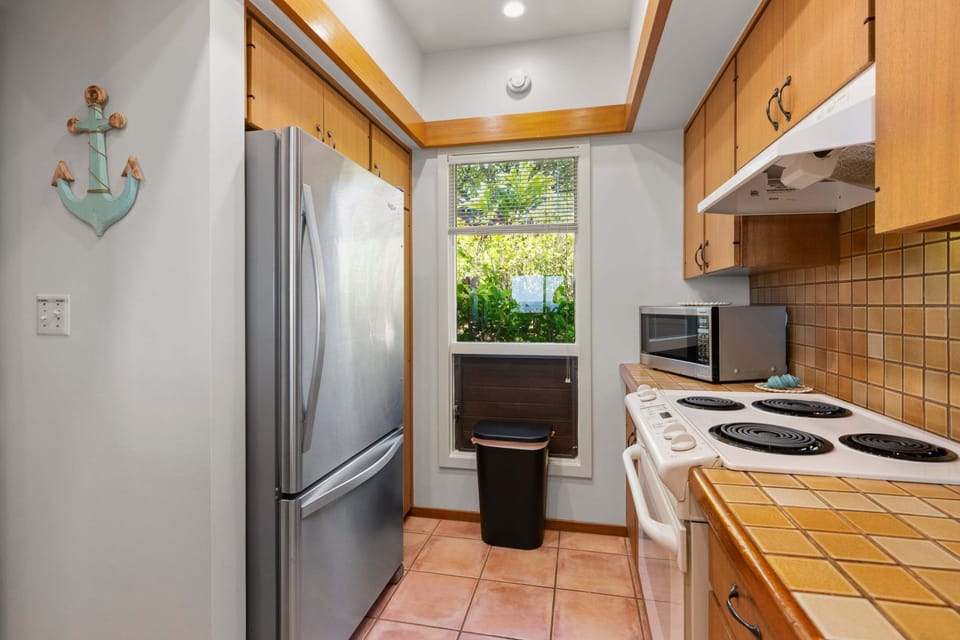 A fully equipped kitchen provides everything you need to make your own Maui-inspired meals.