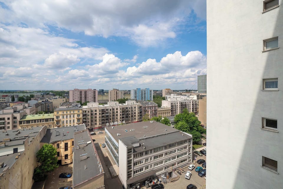 Panoramic urban scenery visible directly from the apartment.