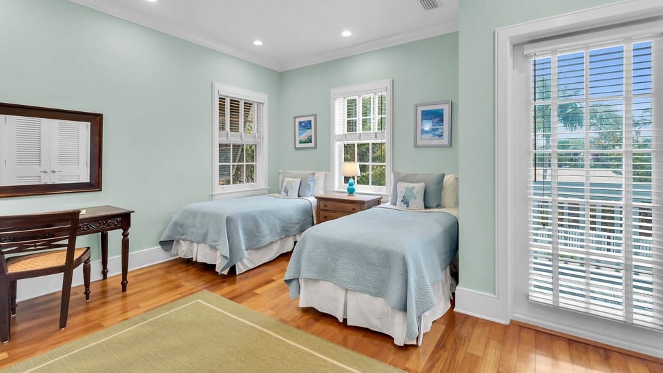 The second floor bedroom has two twins or one king bed...