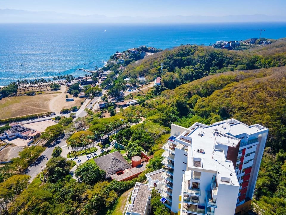 En el sitio,Alrededores,Área y comodidades,Hora del día,Paisaje natural,Playa,Punto de referencia cerca,Ubicación,Vista (de la propiedad / habitación),Vista del punto de referencia,Vista panorámica