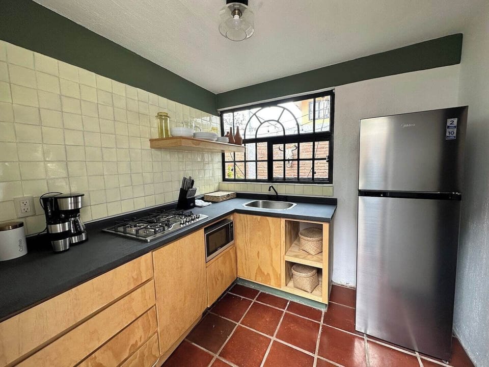 En el sitio,Area de estar,Área para café / té,Área y comodidades,Cocina o kitnet,Ubicación,Vista (de la propiedad / habitación),Vista del Jardín