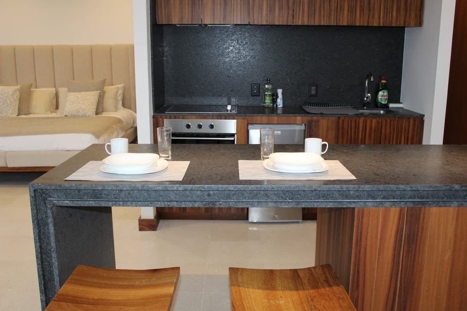 En el sitio,Alrededores,Area de estar,Área para café / té,Área y comodidades,Cocina o kitnet,Detalle decorativo,Ubicación,Vista (de la propiedad / habitación)