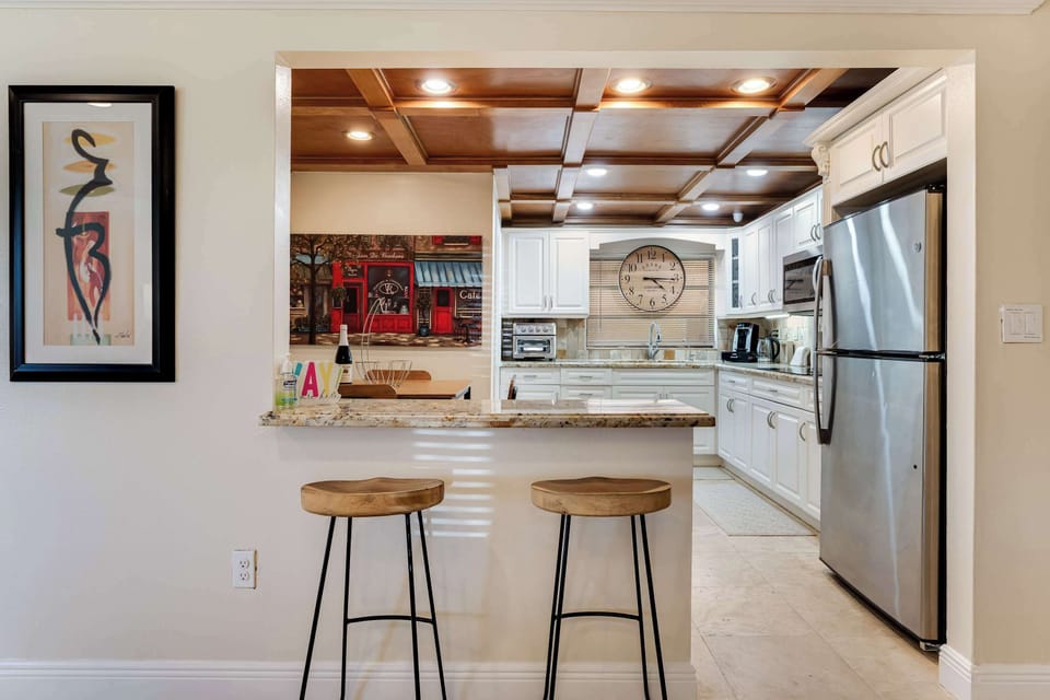 Pull up a stool at the breakfast bar the perfect spot for your morning coffee.