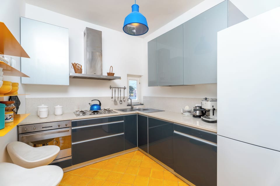 Penthouse, Sea View | Private kitchen | Espresso maker, coffee/tea maker, full-size fridge, microwave